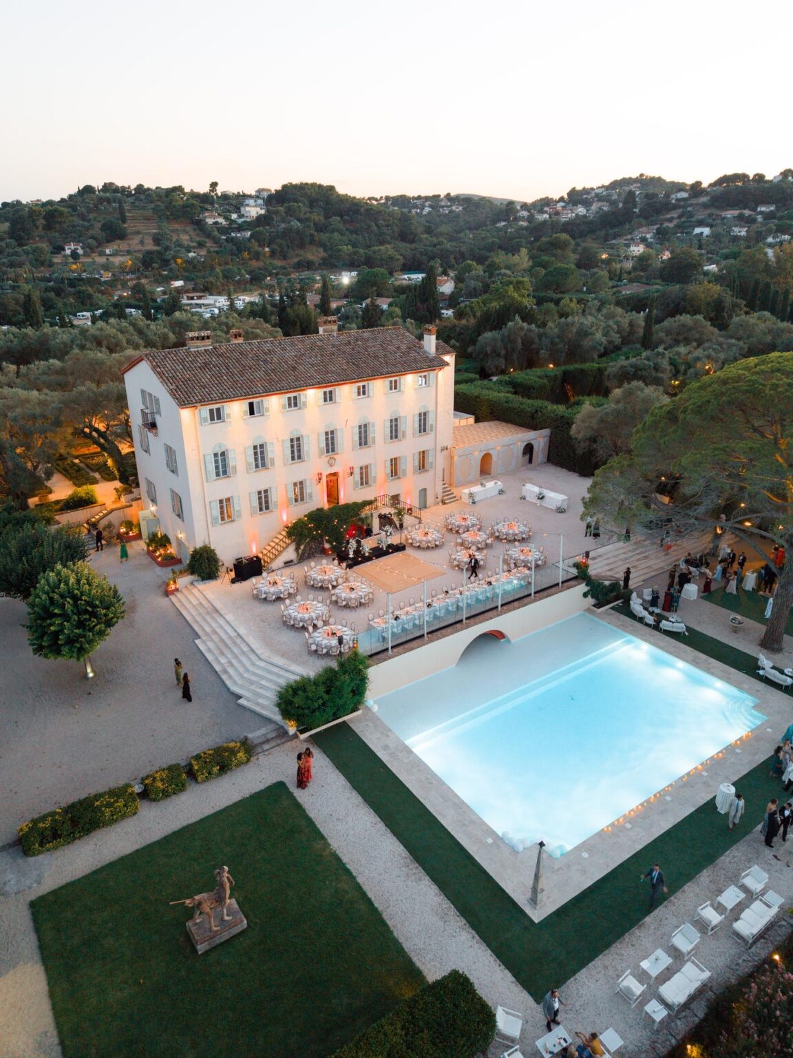 Aerial view of Bastide du Roy and its pool at dusk